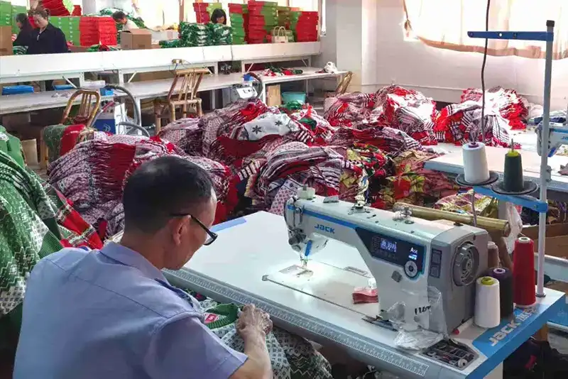 Large-scale factory production of custom Christmas sweaters