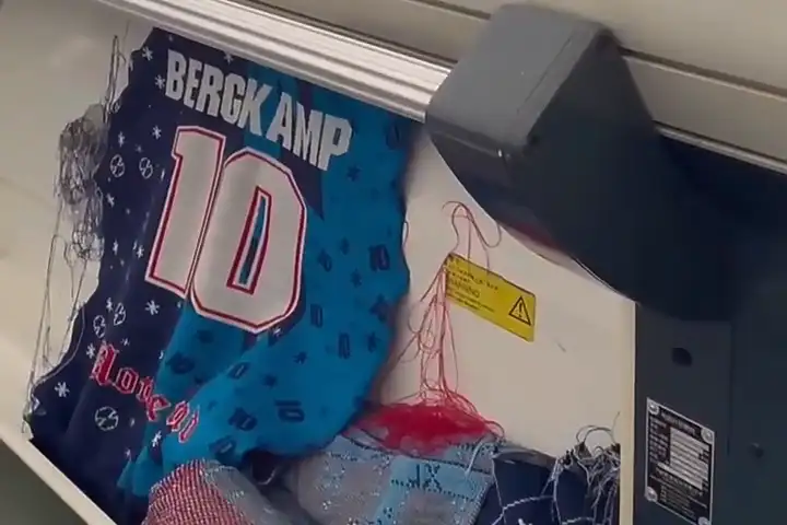 Bulk production details of custom Christmas sweaters for a football club