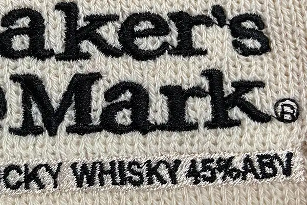 Embroidered logo wine bottle sweater