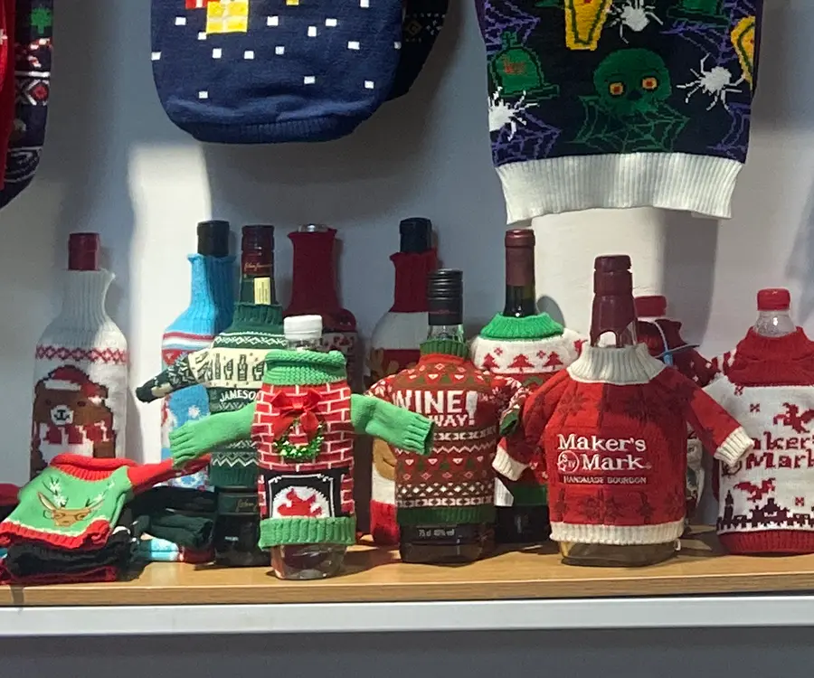 Custom knitted wine bottle sweater samples