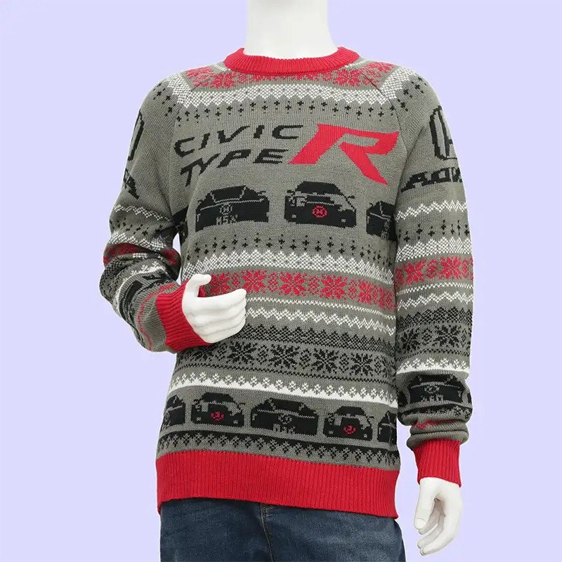 Knit-in logo detail on a Christmas sweater