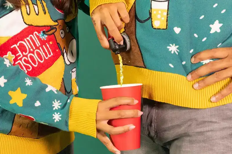 Built-in drink holder system on custom Christmas sweater