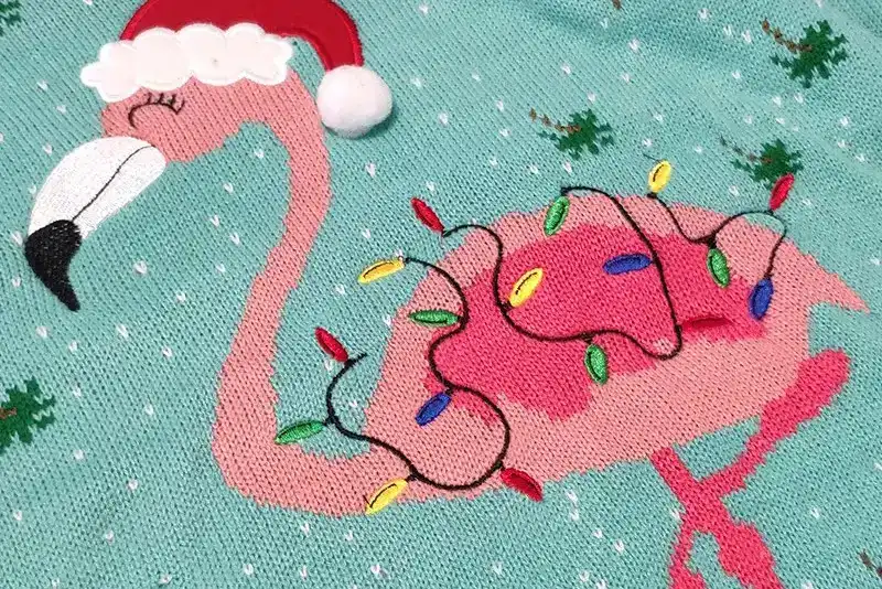 Plain embroidery detail on custom Christmas sweater