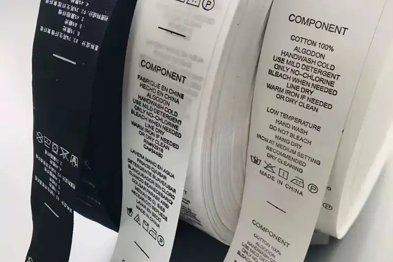 Clear and compliant wash care labels for apparel manufacturing