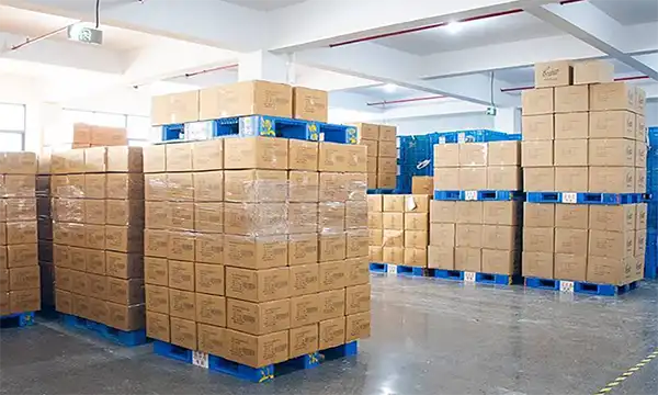 Bulk Christmas sweaters packed in cartons